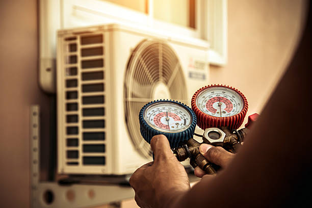 Professional Air Conditioning Service technician working in Sarver, PA